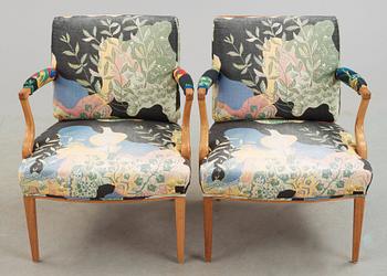 A pair of Josef Frank mahogany and ratten armchairs, Svenskt Tenn, model 969.