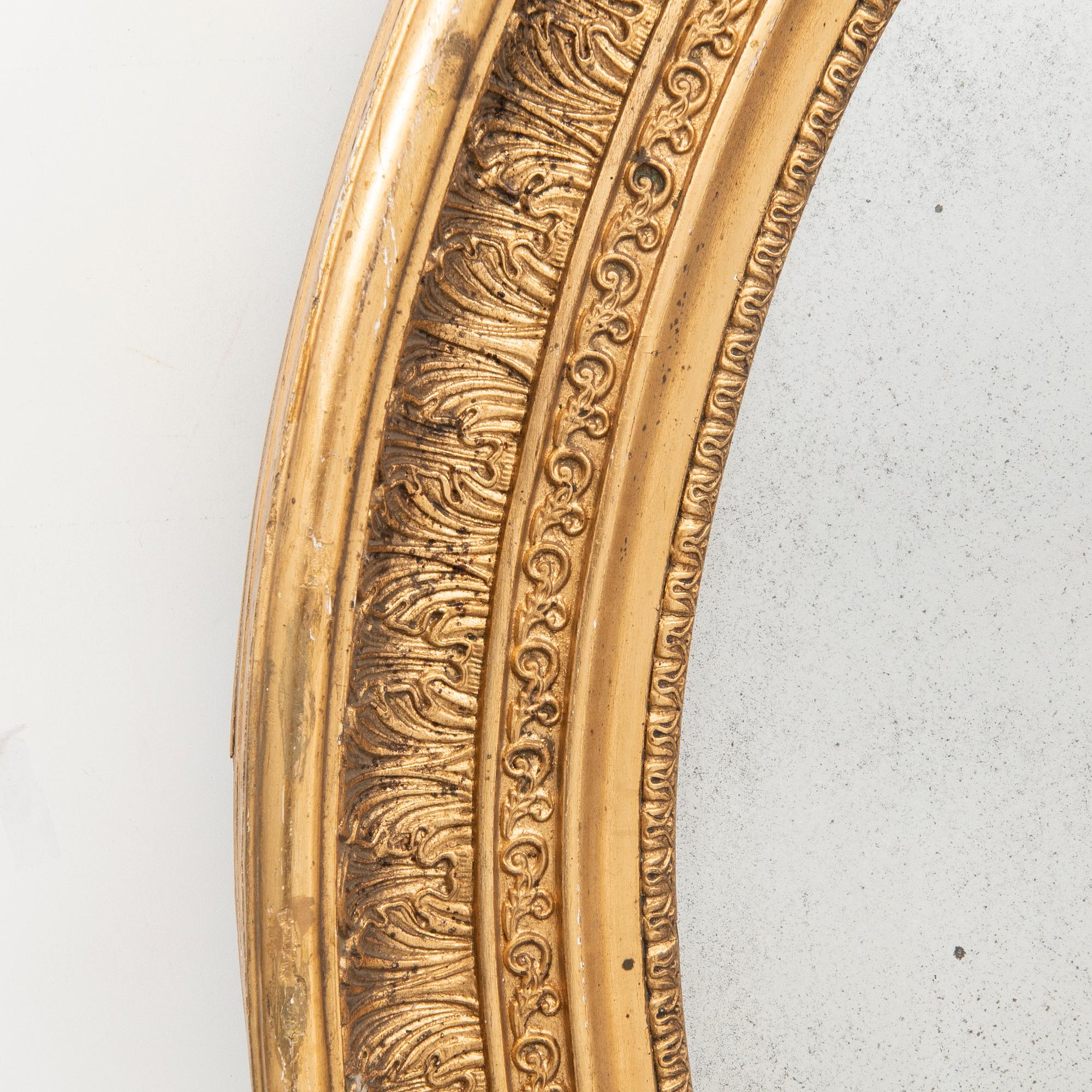 A late empire gided mirror mid 1800s.