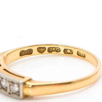 An 18K gold ring with diamonds ca. 0.22 ct in total. Päiviö Veikko, Turku 1955.
