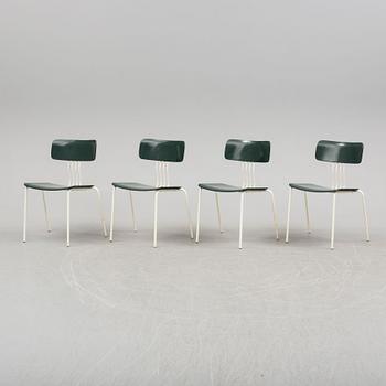 a dining table with four chairs by Sigurd Persson, latter part of 20th century.