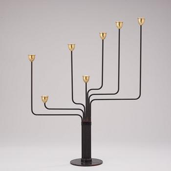 A Piet Hein brass and black lacquered metal candelabrum, 1950's-60's.