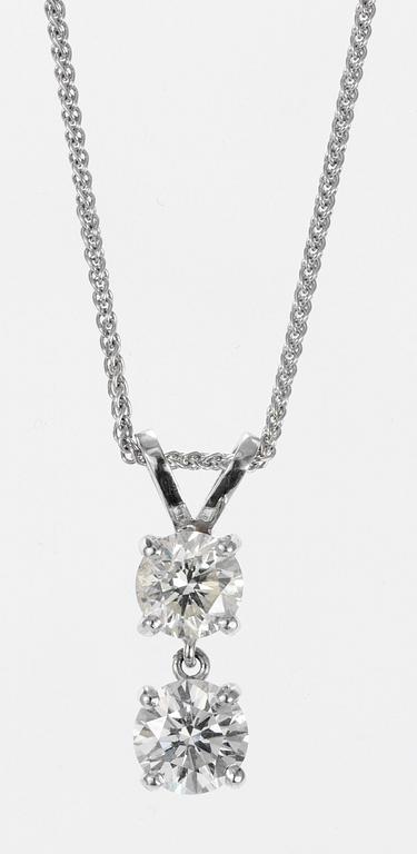 PENDANT, two brilliant cut diamonds, app. 0.80 cts/ 0.60 cts.