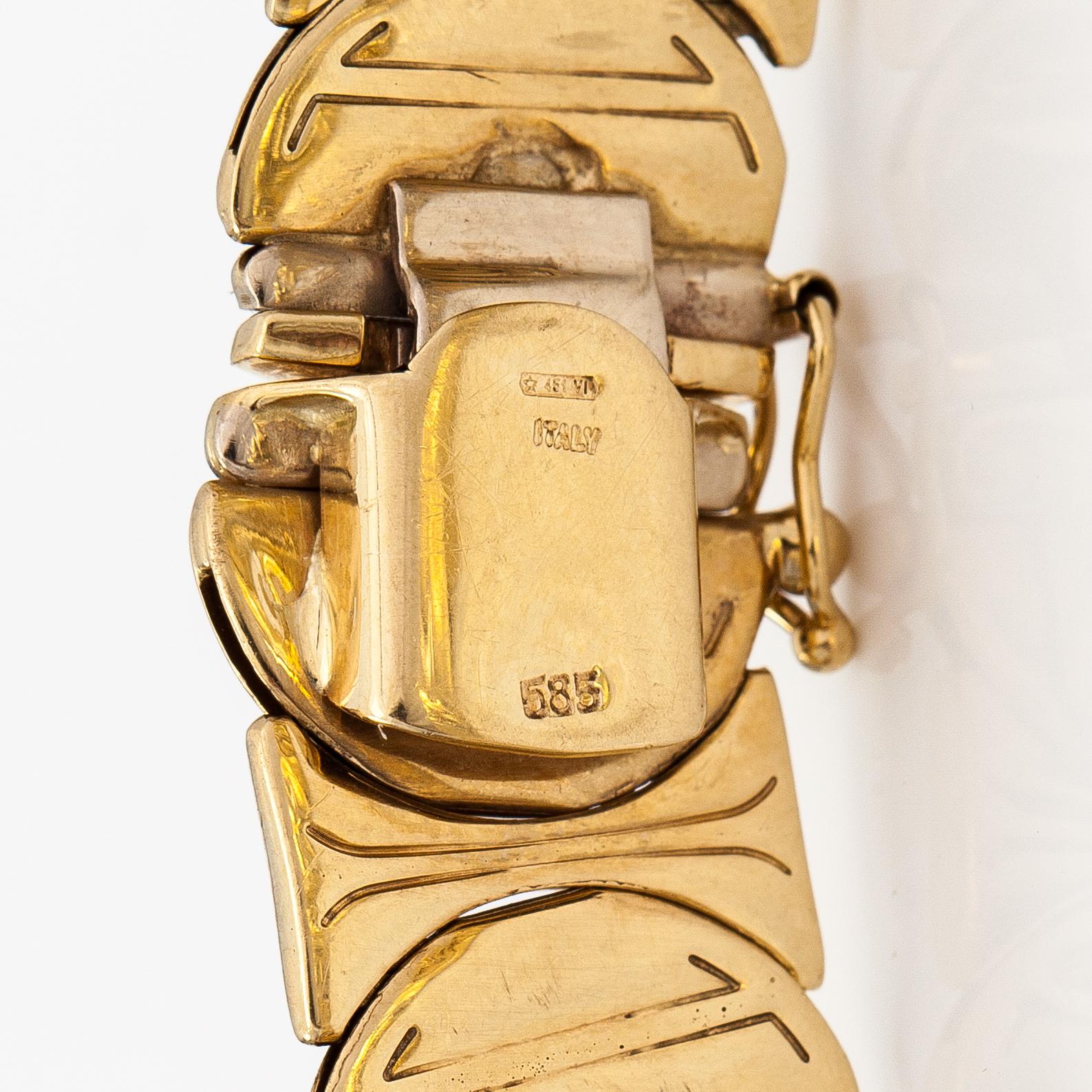 A 14K white and yellow gold bracelet.