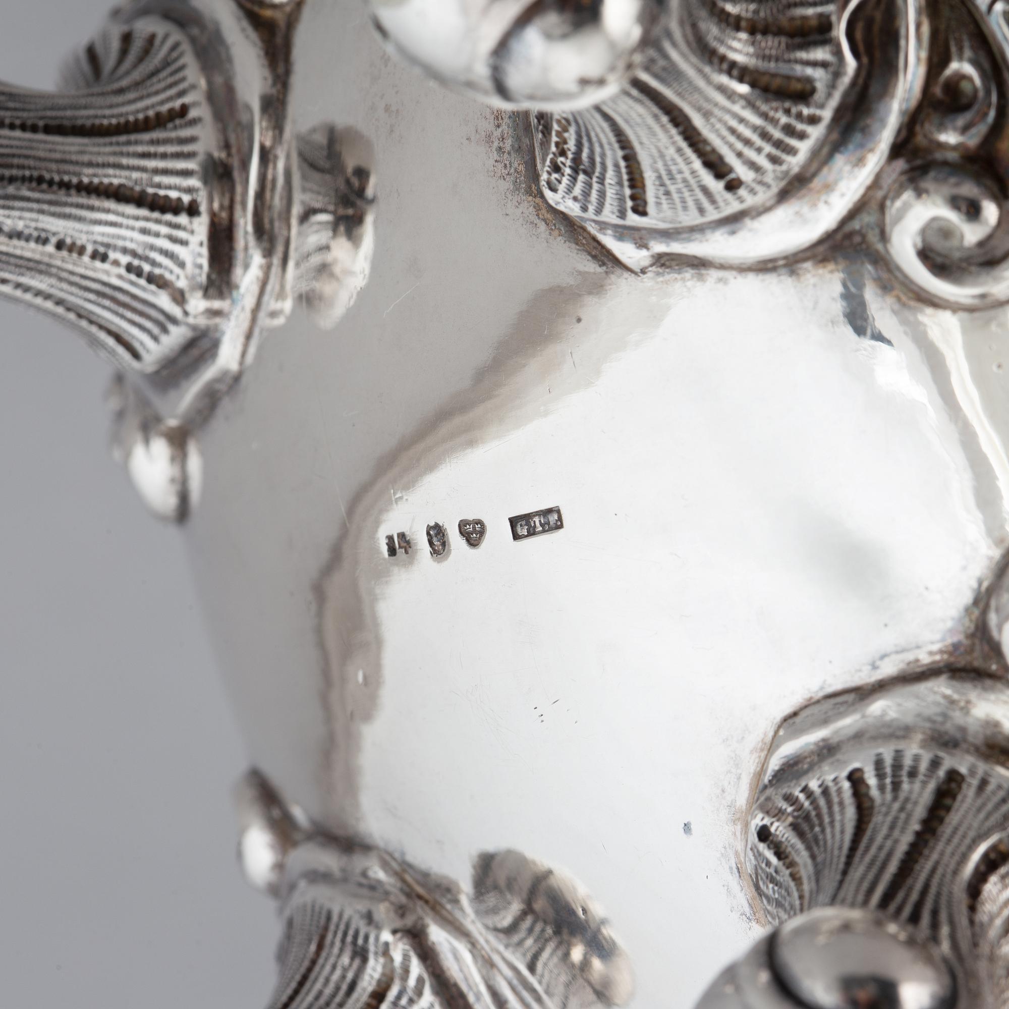 A Swedish rokoko-style silver coffee-pot, mark of Gustaf Theodor Folcker, Stockholm 1848.