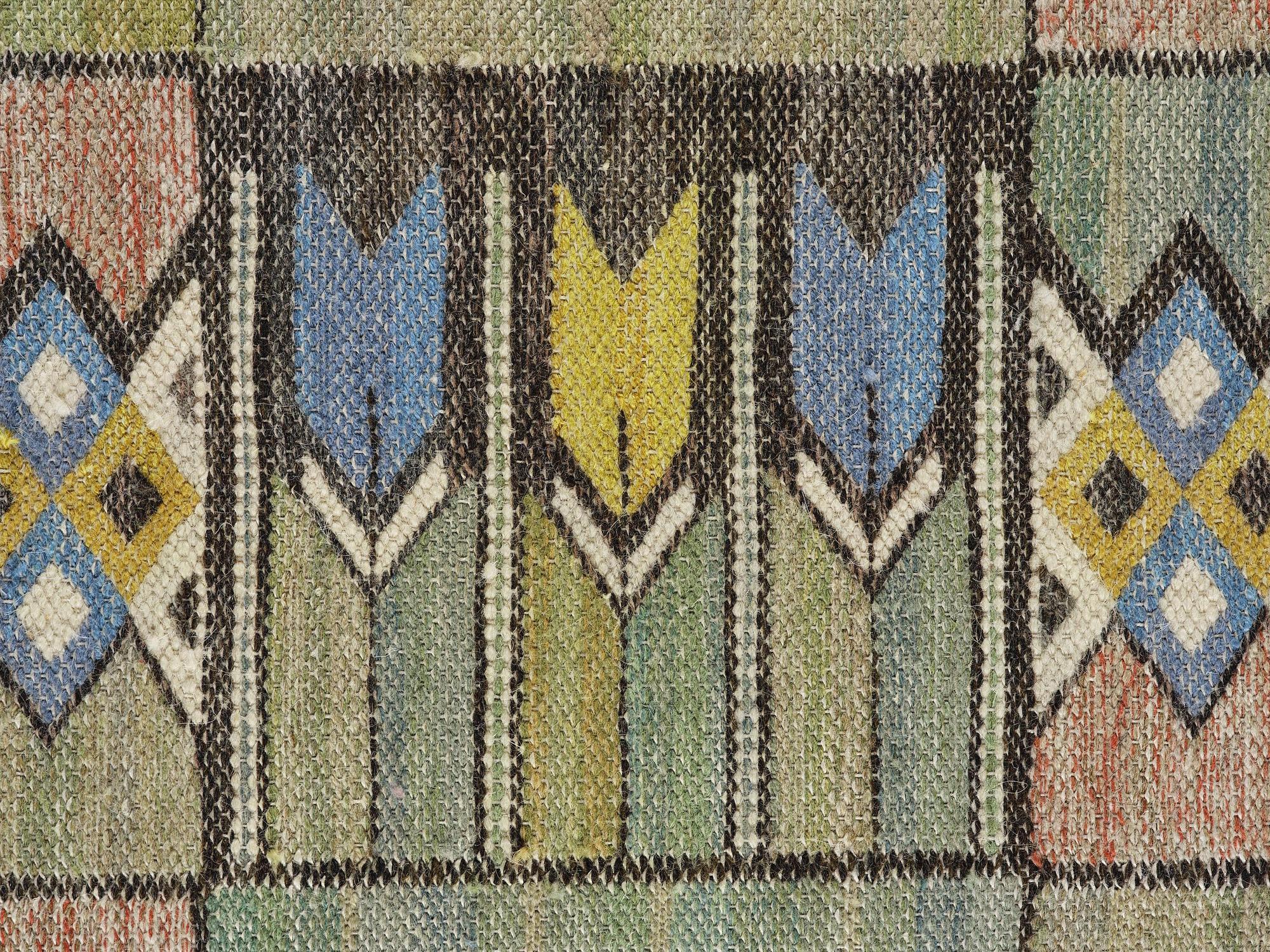 Märta Måås-Fjetterström, a 'Crocus' textile, c. 25 x 62 cm, signed AB MMF.