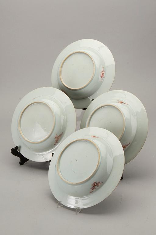 A set of four Chinese famille rose Qianlong porcelain plates.