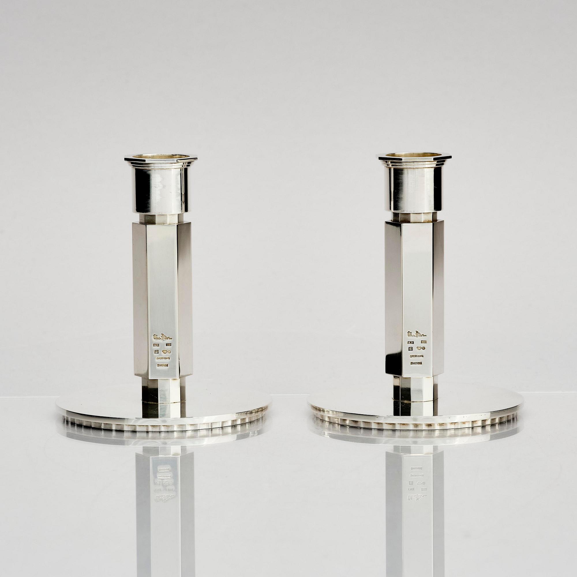 Wiwen Nilsson, a pair of sterling silver candlesticks, Lund, Sweden 11957 and 1960.