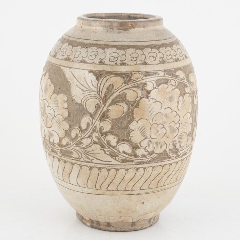 A Chinese glazed stoneware jar, probably Ming dynasty (1368–1644).