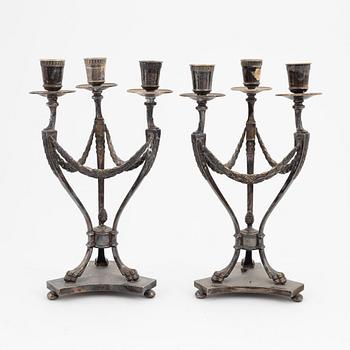 A pair of Gustavian style silverplated candelabra, around the year 1900.