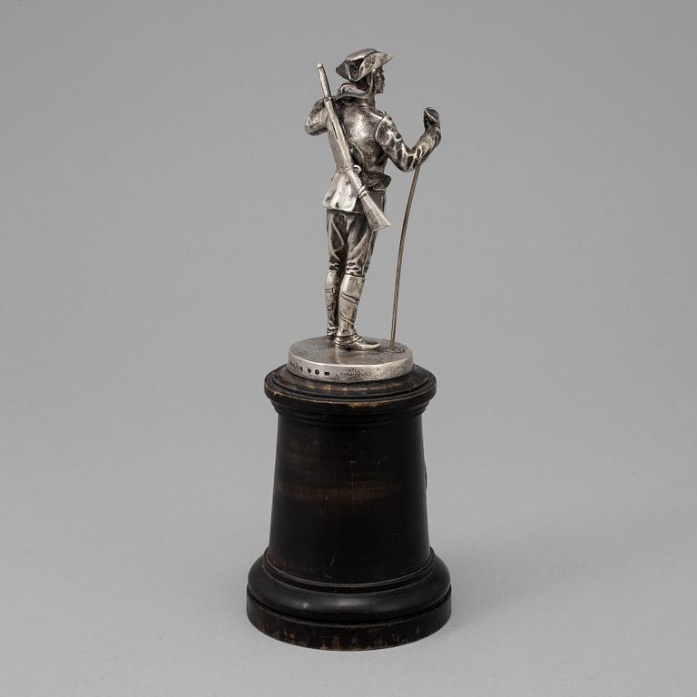 A Swedish silver figurine from CG Hallberg in Stockholm with unclear hallmarks.