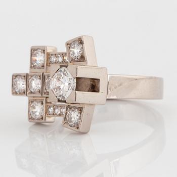 A Claës Giertta 18K white gold ring set with round brilliant- and eight-cut diamonds.