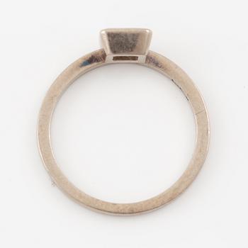 Ring, 14K white gold with emerald-cut diamond.
