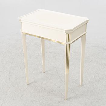 A Gustavian style side table, early 20th century.