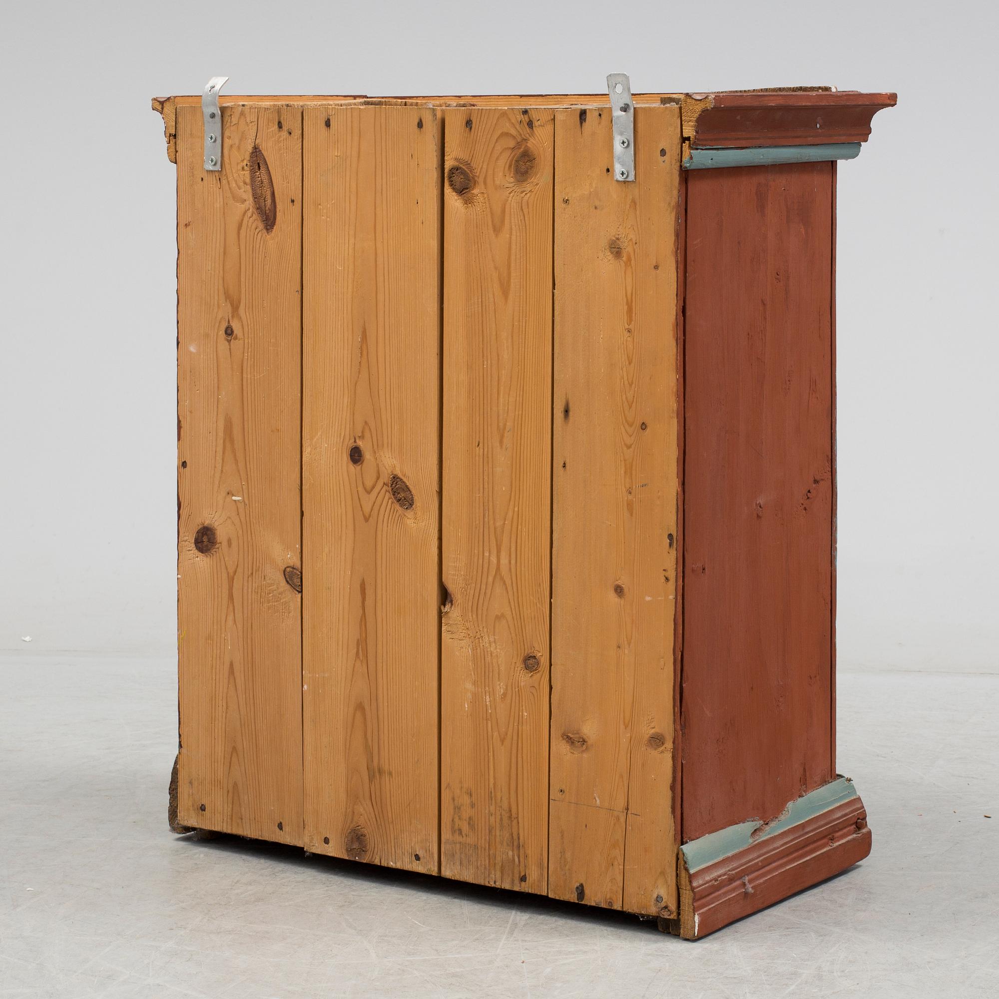 a painted cabinet dated 1828.