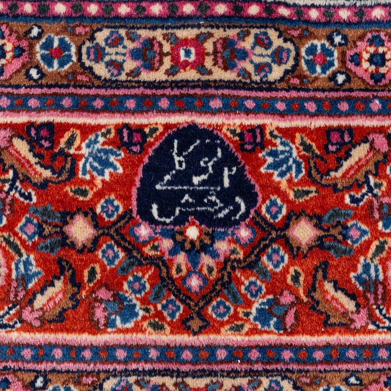 A carpet, oriental, approx. 302 x 210 cm.