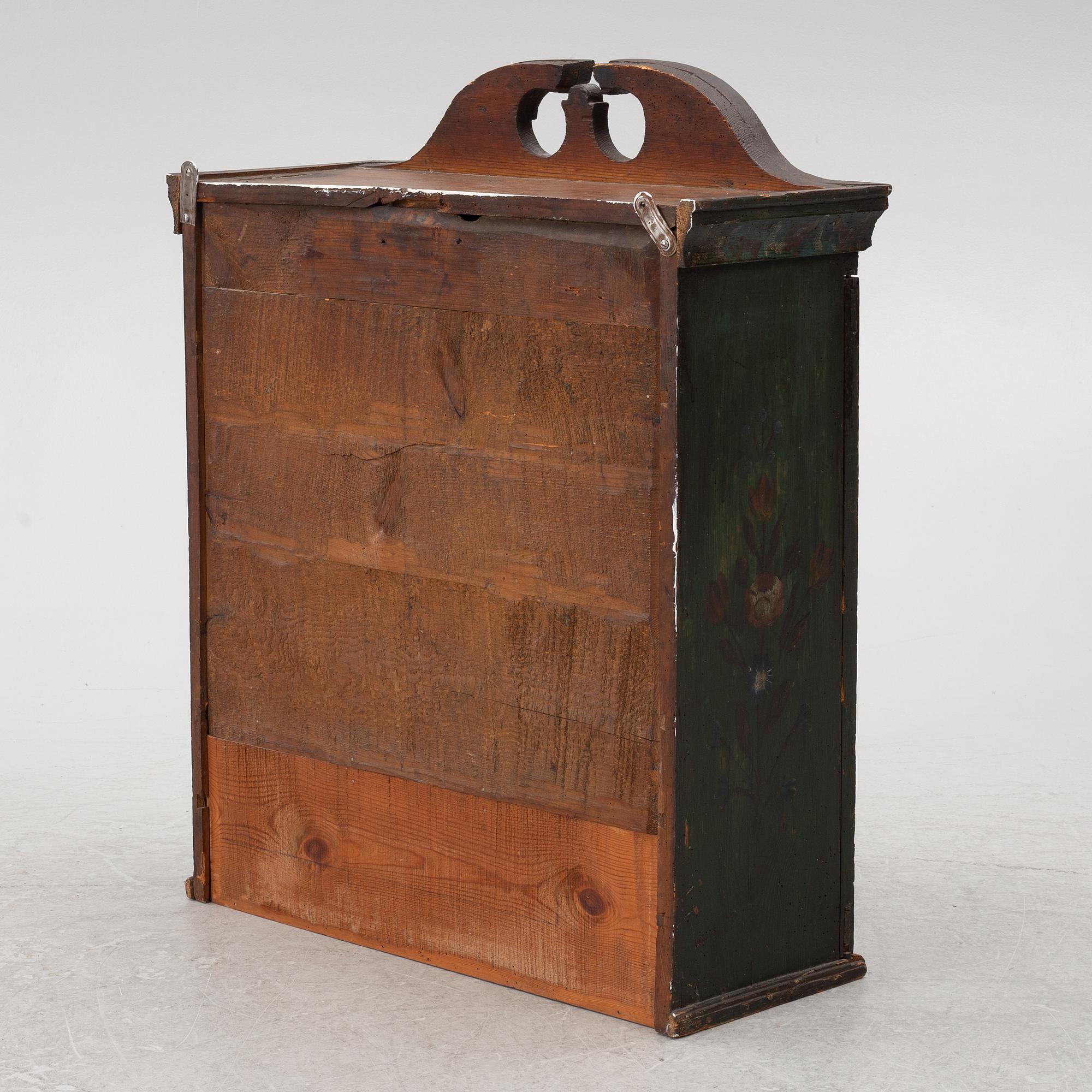A wall-hanged cabinet, Sweden, dated 1851.