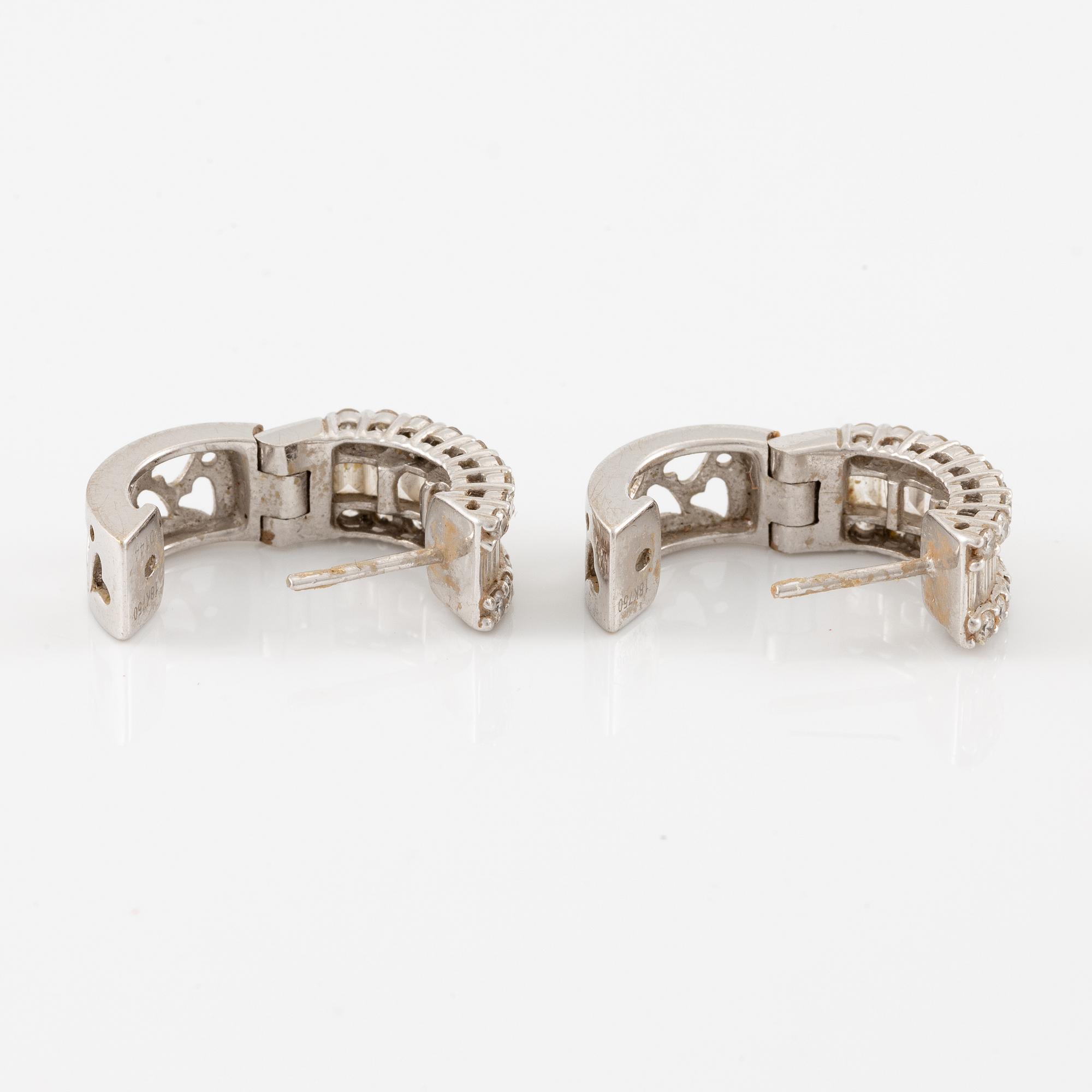 Earrings, a pair, 18K white gold set with baguette and brilliant-cut diamonds.