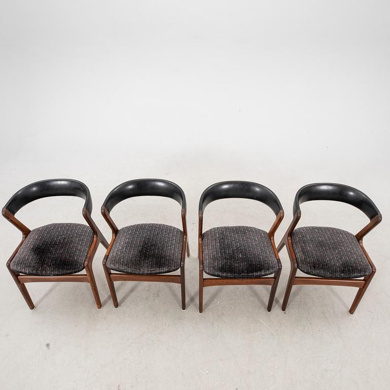 Kai Kristiansen, a set of four walnut chairs mid 1900s.