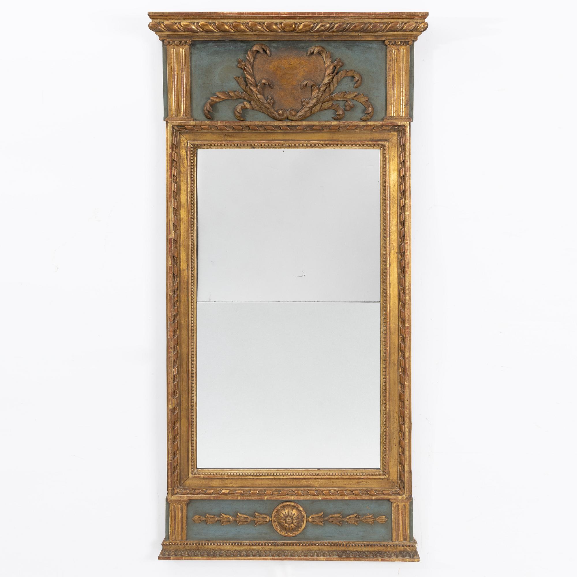A late Gustavian giltwood mirror, circa 1800.