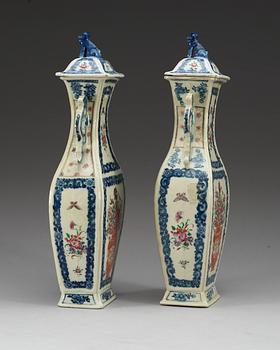 A pair of famille rose vases with covers, Qing dynasty, Qianlong (1736-95).