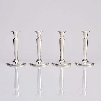 Eric Råström, four silver candlesticks, firm CG Råström, Stockholm 1964-65.