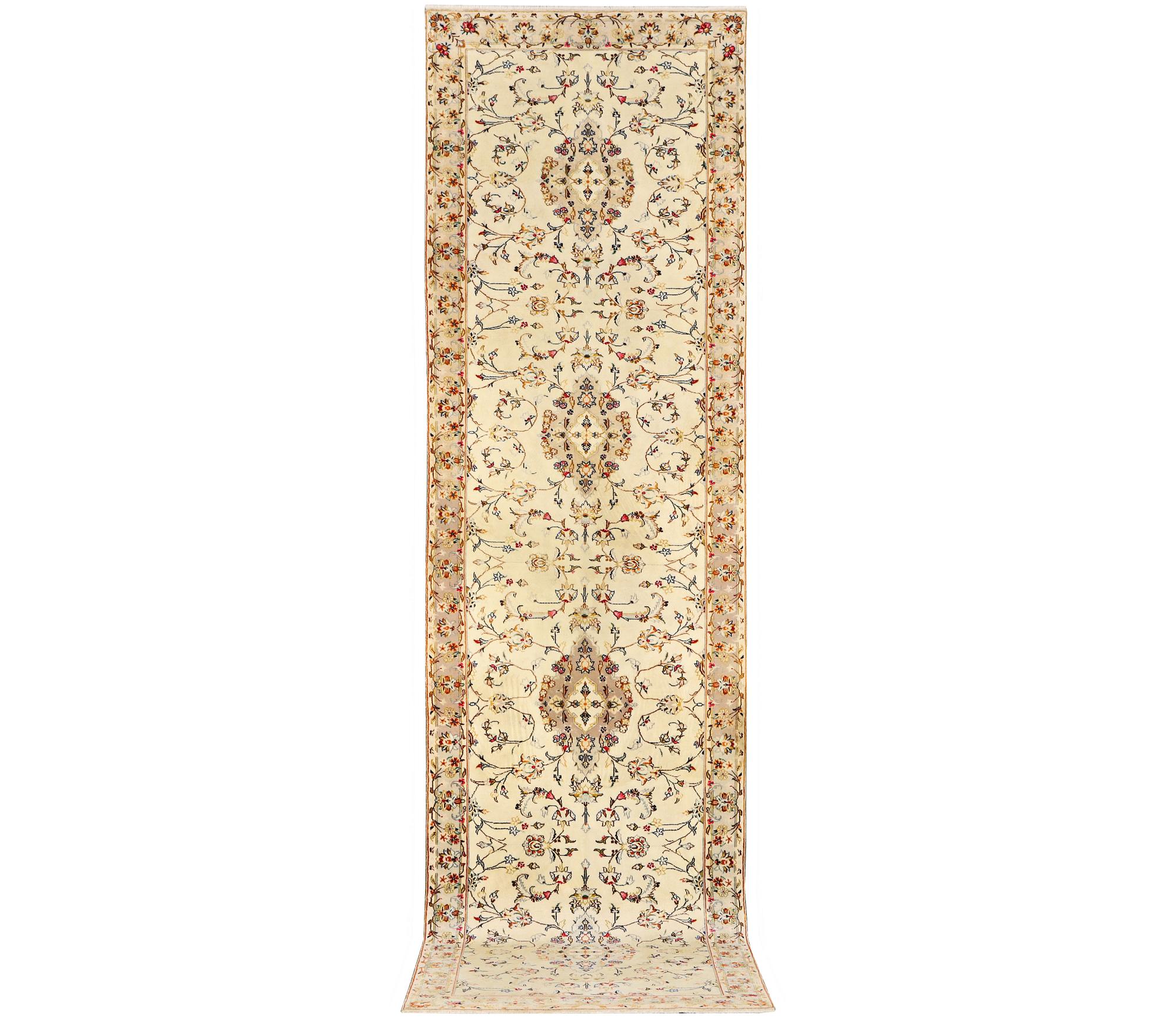 A Keshan runner, c. 385 x 98 cm.