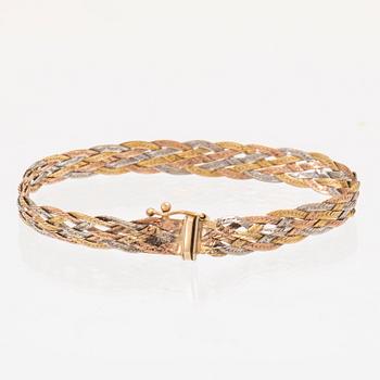 A 14K gold bracelet.