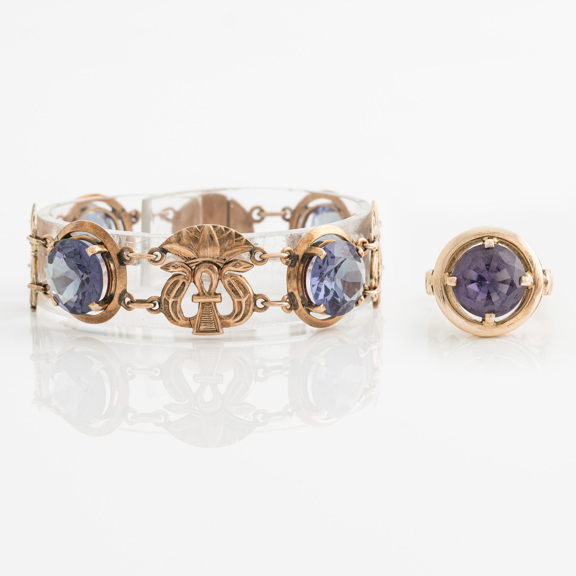 Bracelet and ring with color-changing synthetic stones.