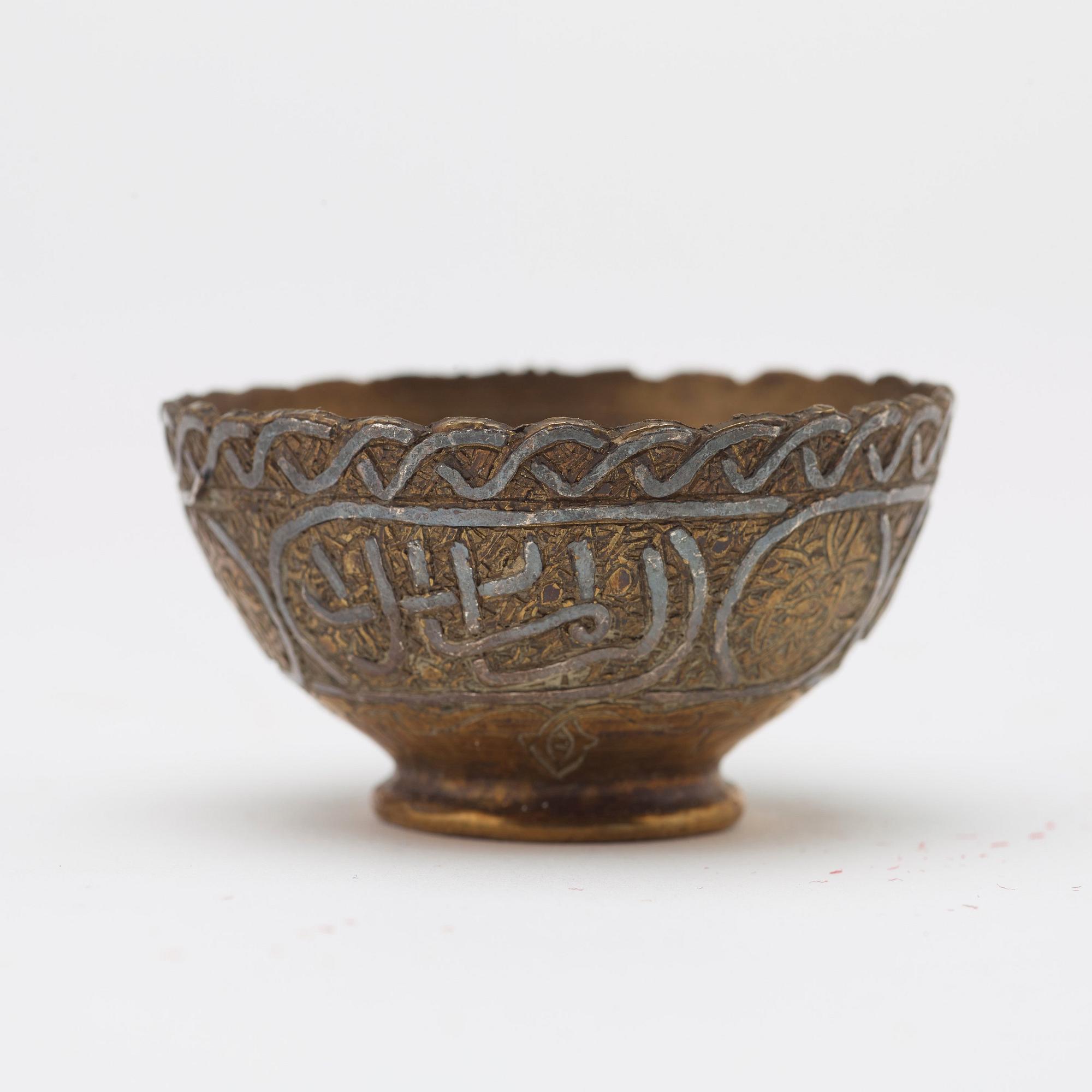 ZARFS, 12 PIECES. Metal. Height ca 3,5 cm each. Iran/Turkey, around 1900 - first half of the 20th century.