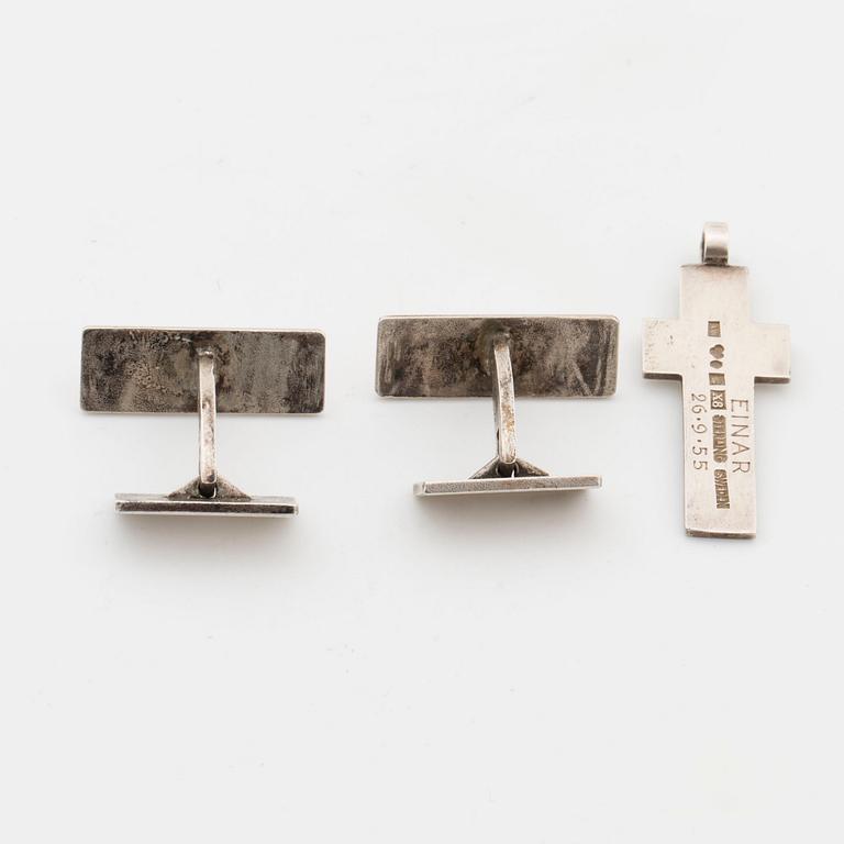 Cross and a couple of silver cuffs, Wiwen Nilsson Lund.