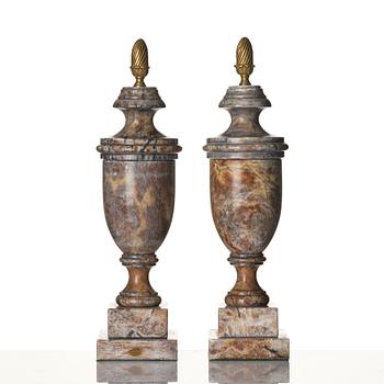 A pair of marble urns, around year 1900.