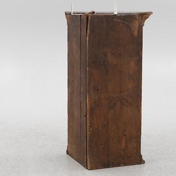 A Swedish painted corner cupboard, 18th Century.