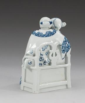 A Swedish 20th cent blue and white figurine, Rörstrand 1920s.