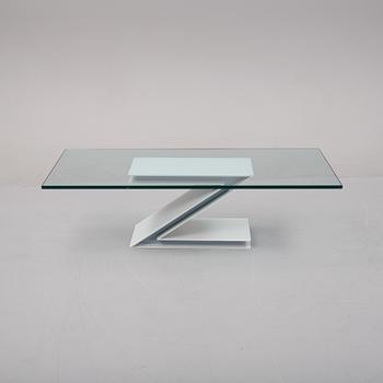 A grey lacquered metal and glass sofa table.