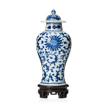 A Chinese blue and white lotus vase with cover, Qing dynasty, 18th Century.