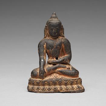 659. A seated clay figure of Amithaba buddha, Tibet/Nepal 18/19th Century or older.