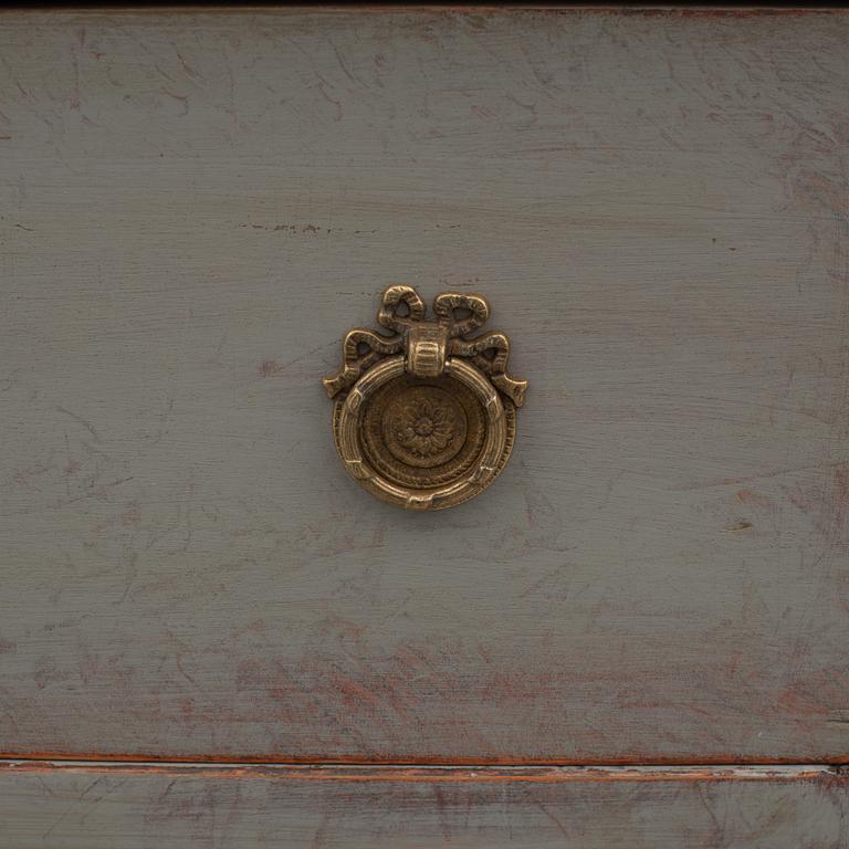 A mid 19th century painted chest of drawers.