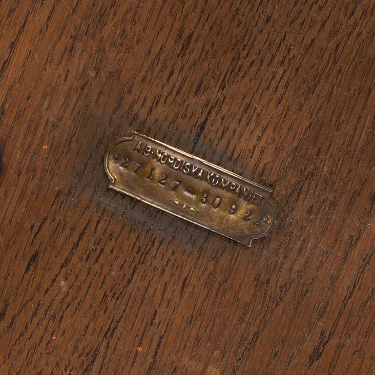 AN OAK TABLE FROM NORDISKA KOMPANIET, 1921.