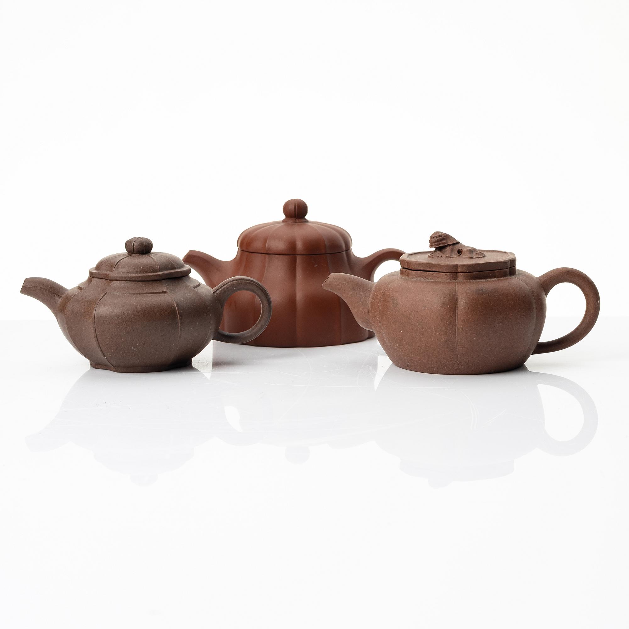A group of three yixing teapots, China, 1980s.