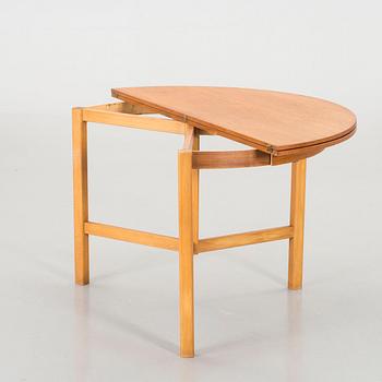 A mid century teak table.