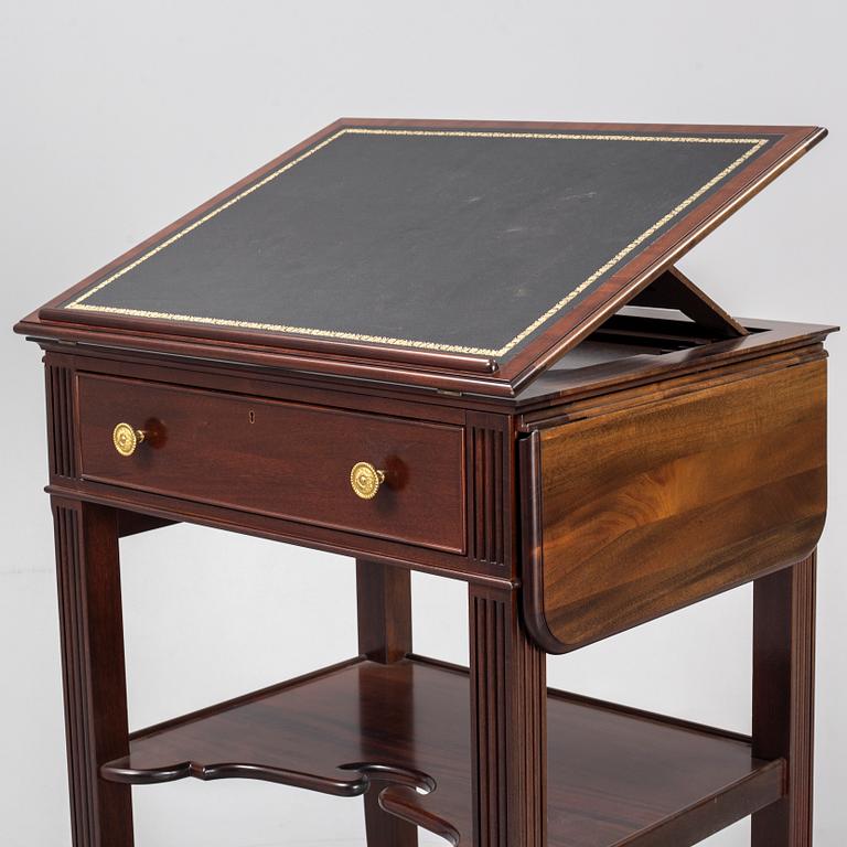 a mahogany writing desk from the second half of the 20th century.