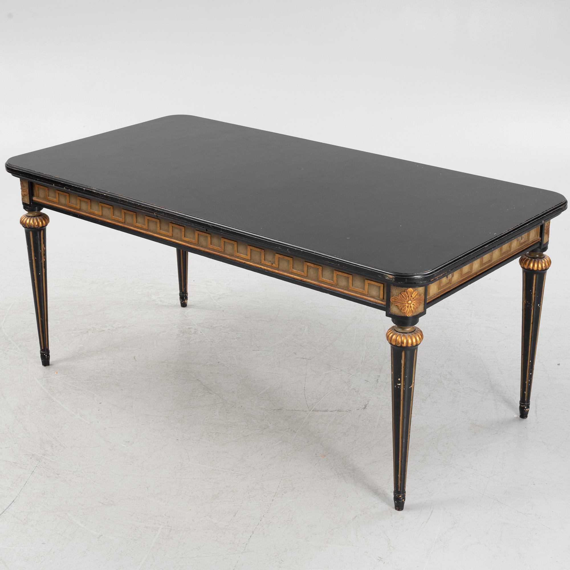 Dining table and 6 chairs, Louis XVI style. Early 20th century.