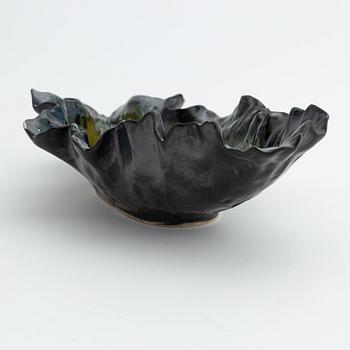 Pol Chambost, a glazed ceramic leaf shaped bowl or dish, signed.