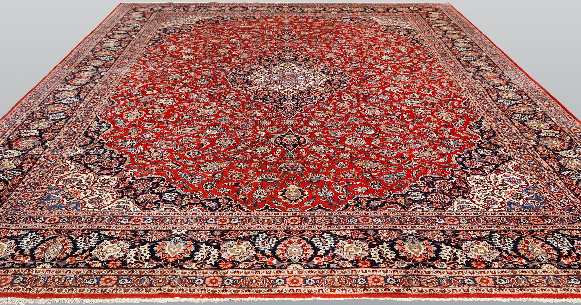 Carpet, Keshan, semi-antique, signed, 439 x 316 cm.