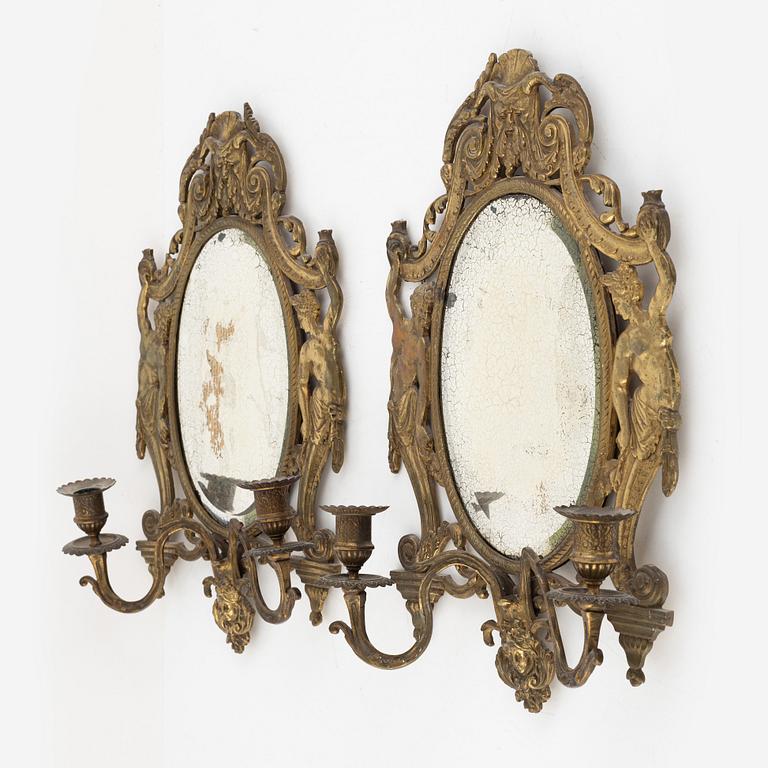 A pair of eclectic mirror sconces, first half of the 20th century.