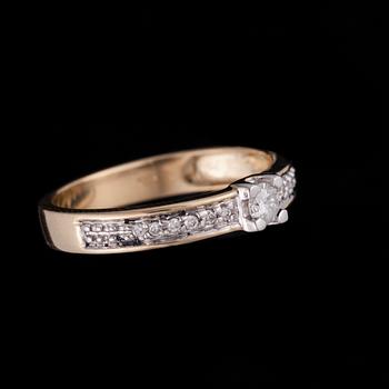 RING, 14K guld, diamanter tot. 0,20 ct. Stockmann logo. Vikt 2,7 g.