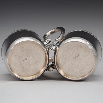 A pair of Russian 20th century parcel-gilt tea-glas holders, marks possibly of Vasily Andreyev, Moscow 1908-1917.
