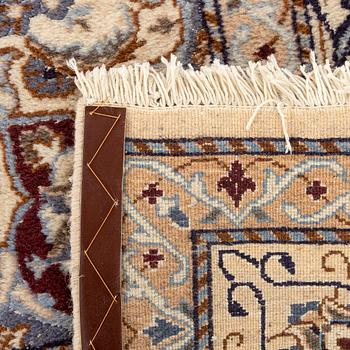 An old Kerman carpet ca 349 x 242 cm.