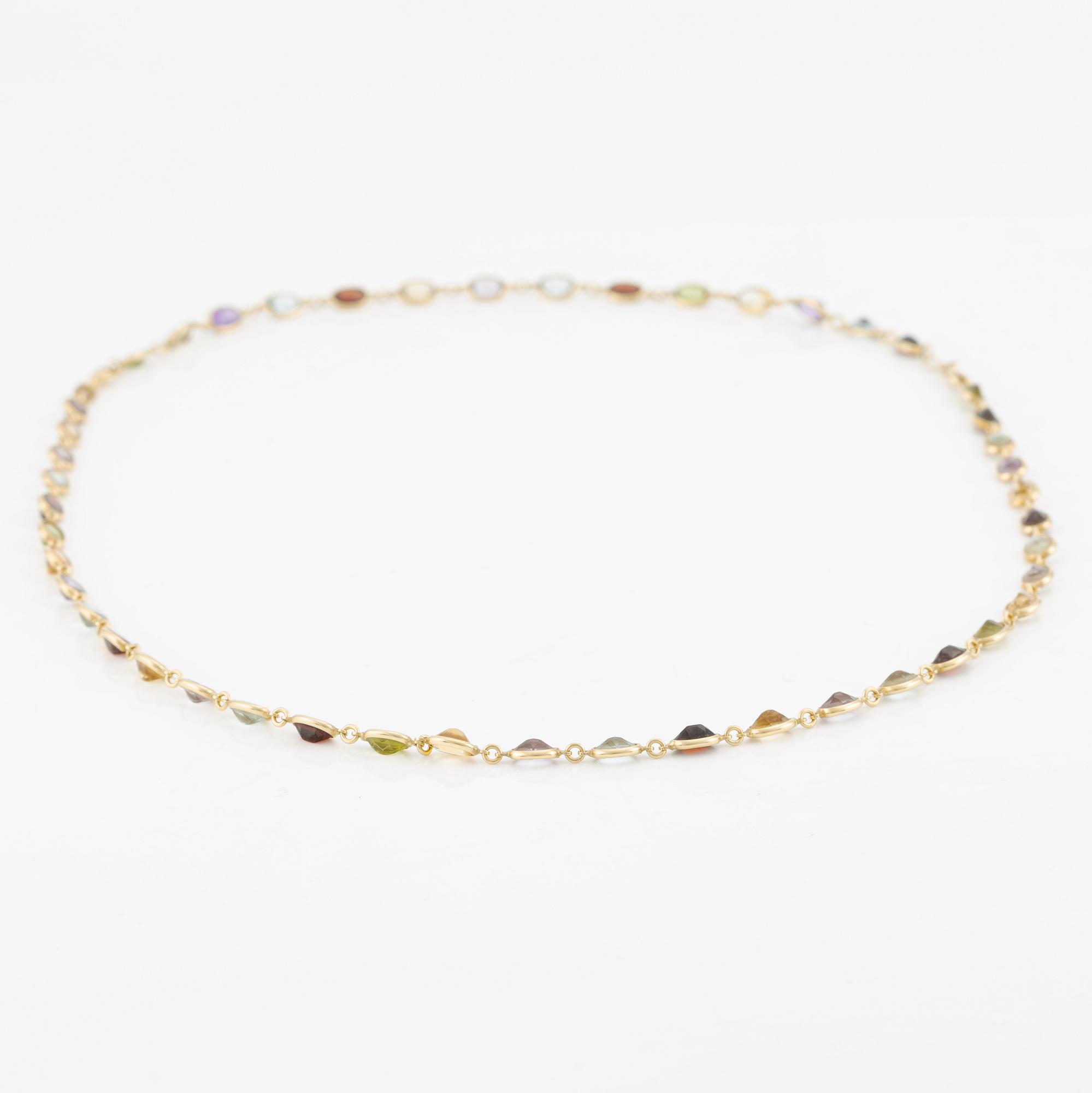 Necklace/bracelet in 18K gold with various coloured gemstones including topaz, citrine, amethyst, garnets, and peridot.