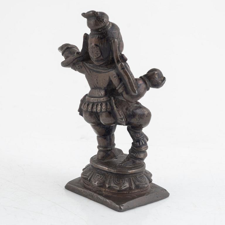 A small bronze figure of Krishna, Southern India, 16th/ 17th century.